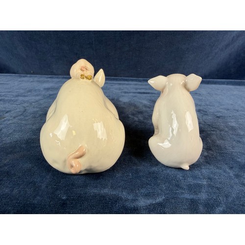 220 - A collection of 5 china pig ornaments being Beswick, Lladro, Royal Copenhagen, Belleek - floral trea... 