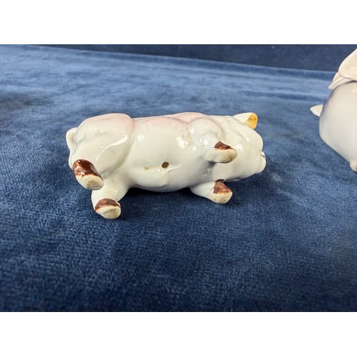 220 - A collection of 5 china pig ornaments being Beswick, Lladro, Royal Copenhagen, Belleek - floral trea... 