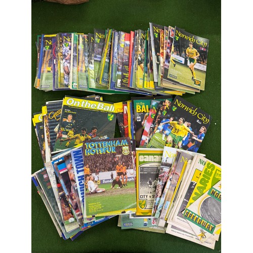 431 - A large collection of football programmes for Norwich City, either playing at home games or away gam... 
