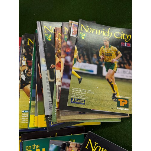 431 - A large collection of football programmes for Norwich City, either playing at home games or away gam... 
