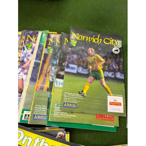 431 - A large collection of football programmes for Norwich City, either playing at home games or away gam... 