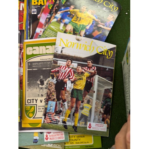 431 - A large collection of football programmes for Norwich City, either playing at home games or away gam... 