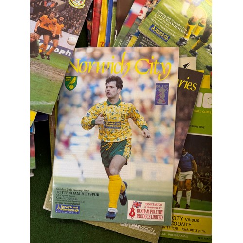 431 - A large collection of football programmes for Norwich City, either playing at home games or away gam... 