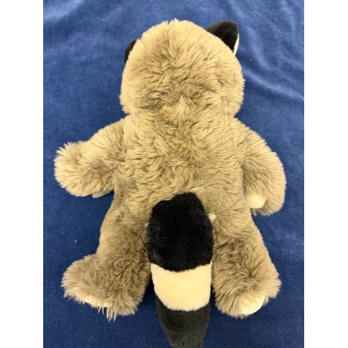 279 - A vintage Steiff soft toy/ teddy depicting a raccoon, having a metal 'Steiff' stud and label  attach... 