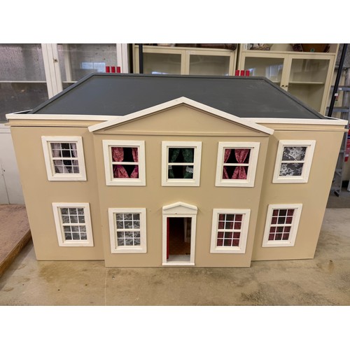 229 - A hand made dolls house, with 2 section opening front.