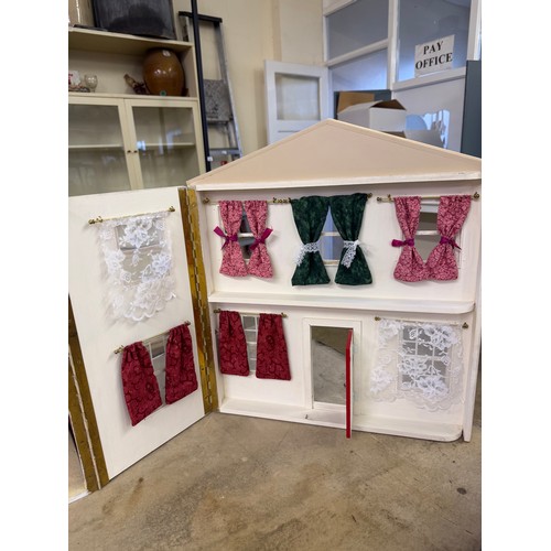 229 - A hand made dolls house, with 2 section opening front.