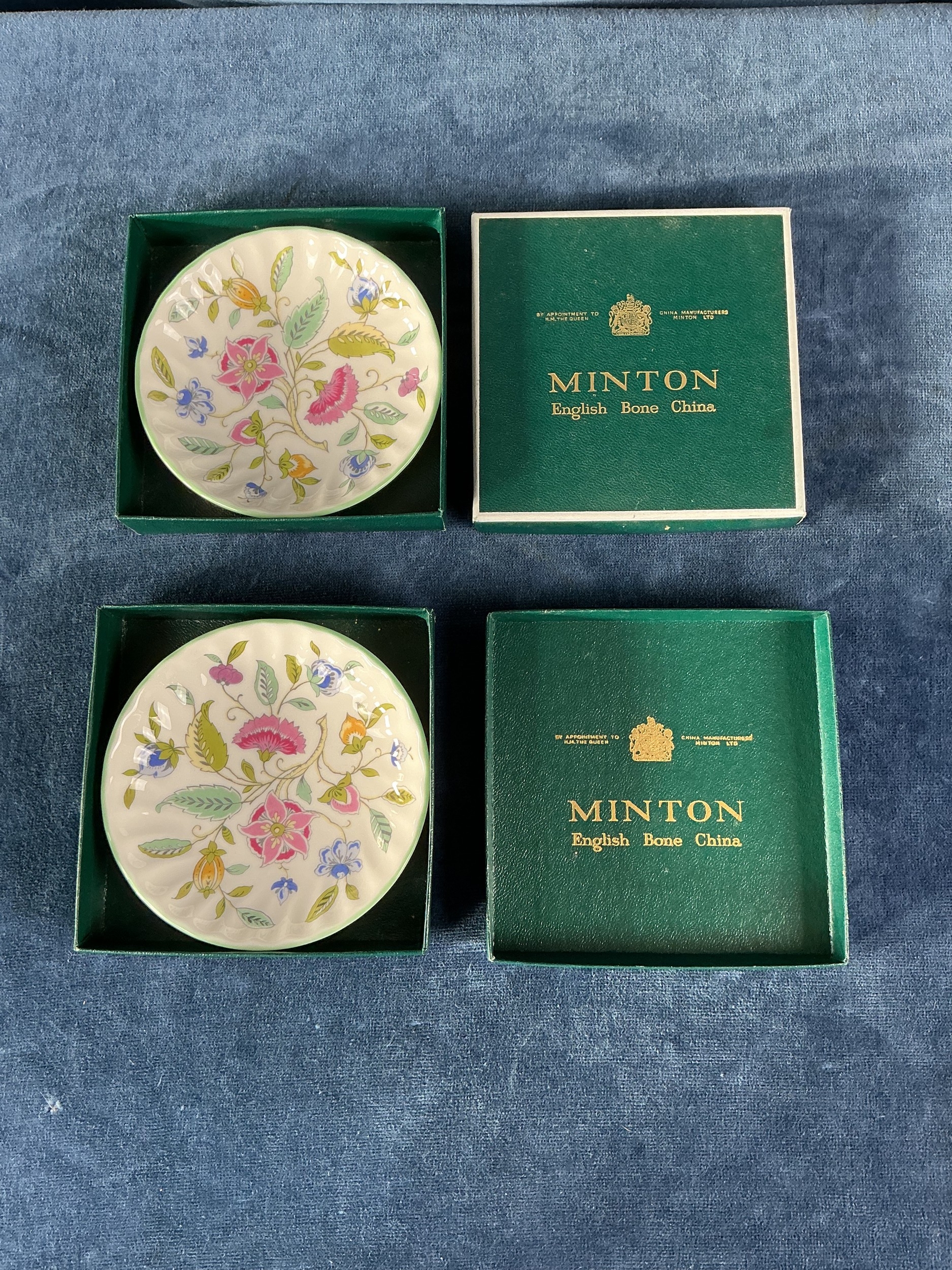 A pair of Minton 'Haddon Hall' pattern bone china dishes in original boxes.