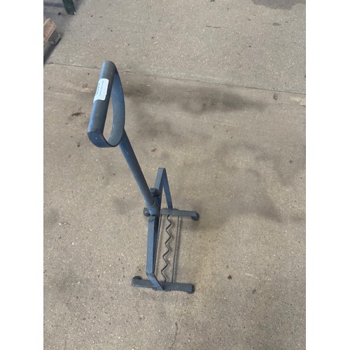 6030 - A wrought iron boot scrapper with adjustable handle.