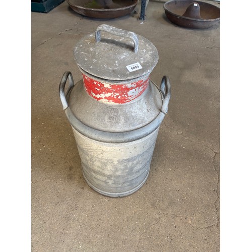 6059 - An aluminium milk churn - approx 62cm tall