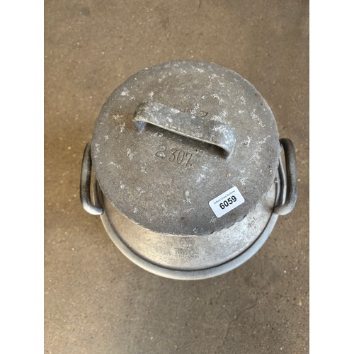 6059 - An aluminium milk churn - approx 62cm tall