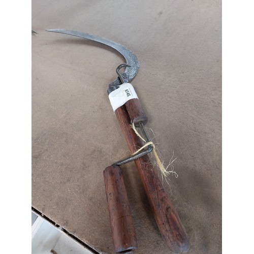 6145 - A vintage reaping hook and a straw truss wimble.