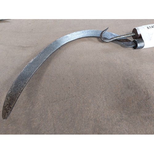 6145 - A vintage reaping hook and a straw truss wimble.