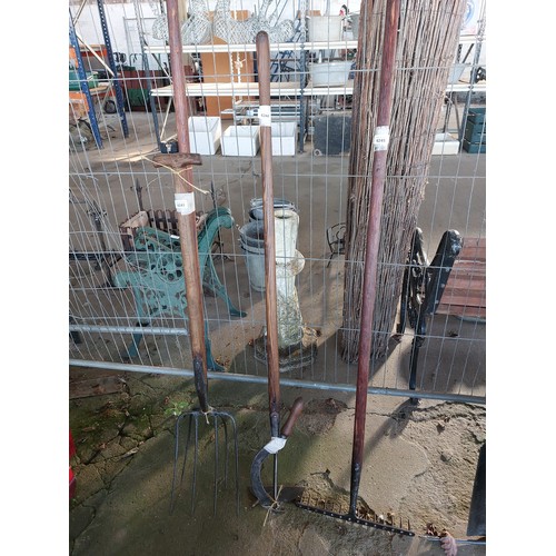 6244 - A vintage hoe and beet hook.