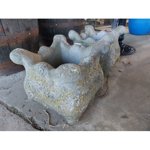 6249 - A pair of concrete plant pots.