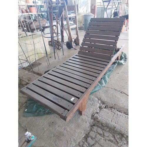 6266 - A teak wood sun lounger with cover.