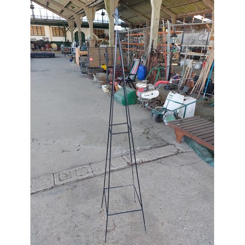6267 - A metal plant obelisk with finial top and one other.