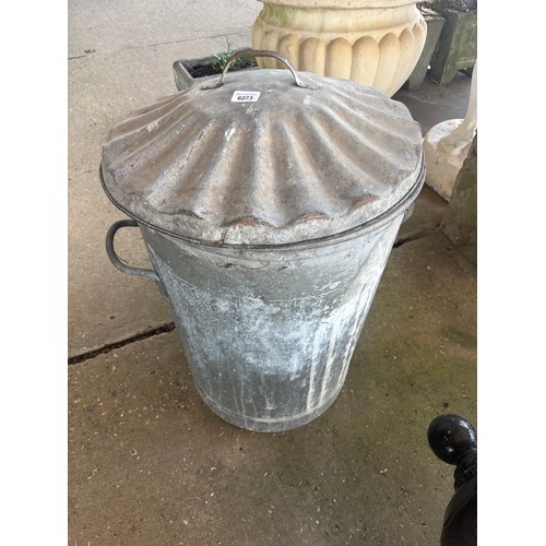 6273 - A galvanised dustbin with lid.