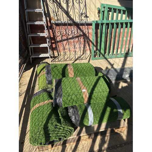 6290 - Seven rolls of artificial grass.