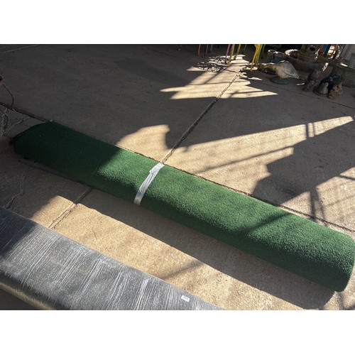 6291 - A roll of artificial grass, measuring approximately 3 x 3m.