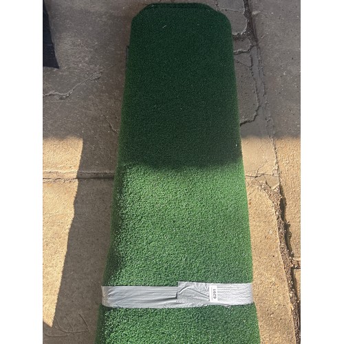 6291 - A roll of artificial grass, measuring approximately 3 x 3m.