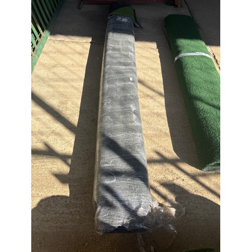 6292 - A roll of artificial grass, measuring approximately 3 x 4m.