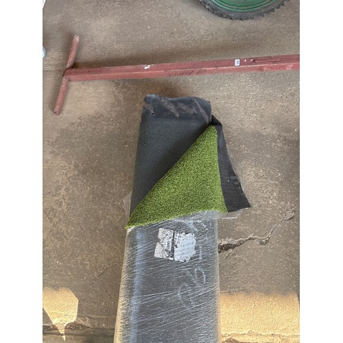 6292 - A roll of artificial grass, measuring approximately 3 x 4m.