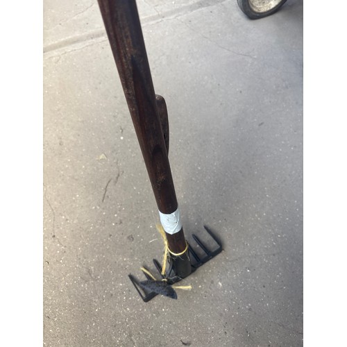 6363 - A vintage rake and hoe.