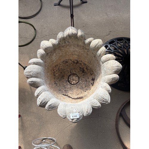 6380 - A concrete tulip planter on pedestal, measuring 58cm tall and 52cm diameter.