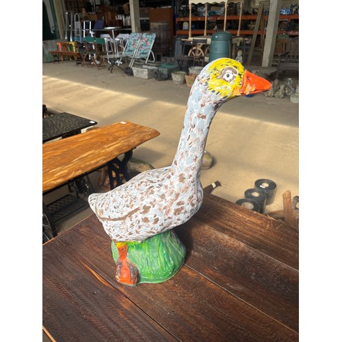 6394 - A plastic composite  goose, measuring 56cm tall.