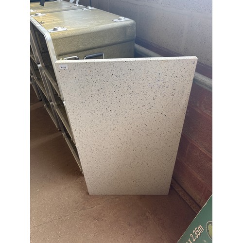 6412 - A speckled white granite work top, measuring 110cm x 64cm.