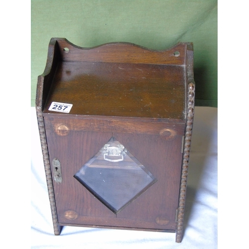 257 - A wooden smoker's cabinet