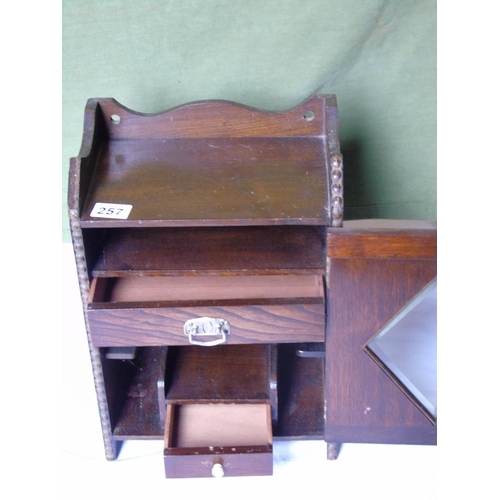 257 - A wooden smoker's cabinet