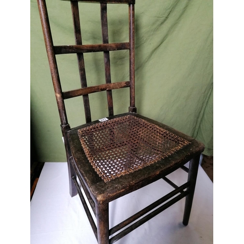 277 - A latticed back occasional chair with cane seat