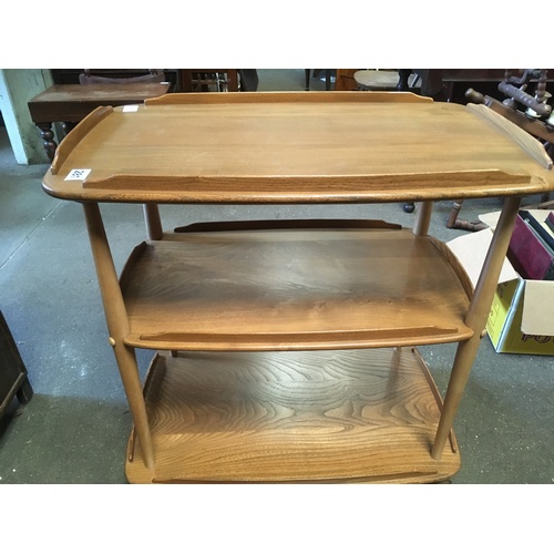 281 - A mid century original Ercol Windsor blonde wood tea trolley