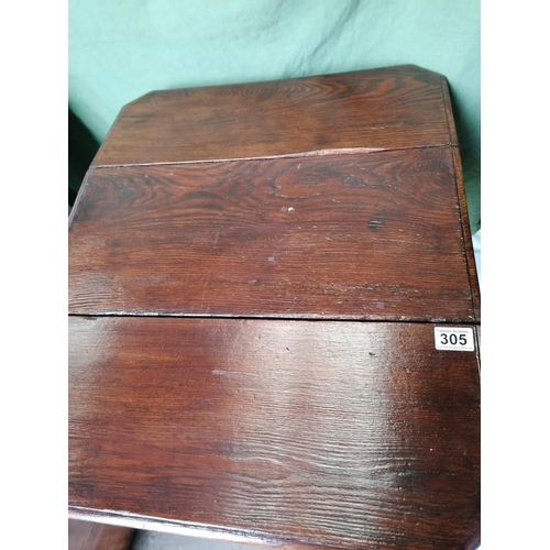 305 - A small Edwardian dropleaf table with balustraded lower tier on bracket feet; ht 59cm
