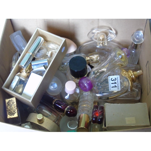 311 - A quantity of vintage perfume bottles