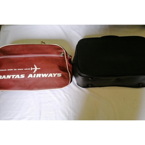 314 - Two vintage zipped bags: one black Gannex and one 1950s Qantas Airways