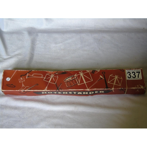337 - A metal folding music stand in box