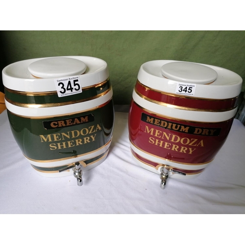 345 - A pair of vintage Mendoza Sherry barrels measuring 27cm W x 20cm D x 30cm H complete with lids and t... 