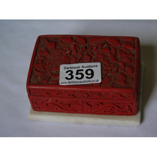 359 - Red lacquered Chinese box on white marble base
