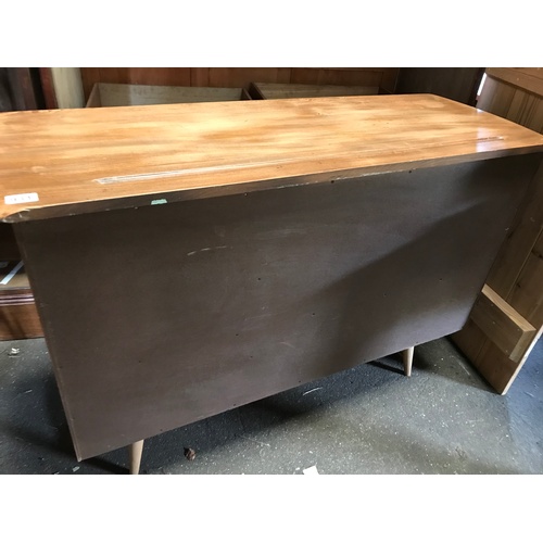 282 - A mid century Ercol Windsor blonde wood beech and elm sideboard in excellent condition, with cutlery... 
