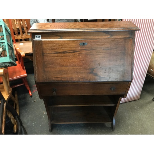 268 - An early 20C oak fall front student's desk with stationery compartments as photographed, f/w drawer ... 