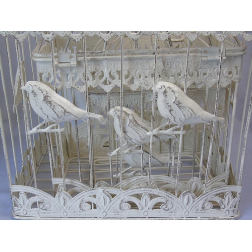 3 - A graduated set of three bird cages