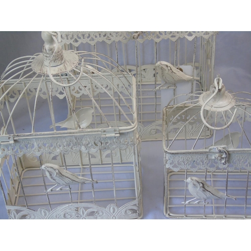 3 - A graduated set of three bird cages