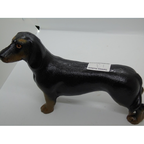 13 - An iron dachshund doorstop