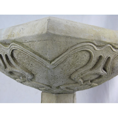 18 - An ornate two piece stone bird bath