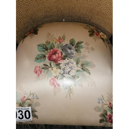 30 - A vintage gold and chintz fabric Lloyd Loom commode chair for indoors/caught short in the garden, co... 