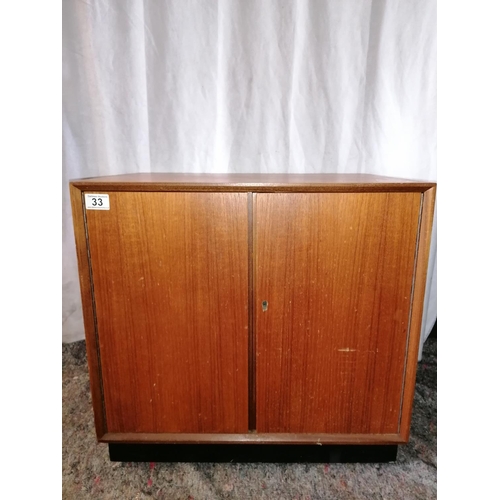 33 - Mid century record cabinet, divided for records and one shelf above, with original key, H 56 cm, W 6... 