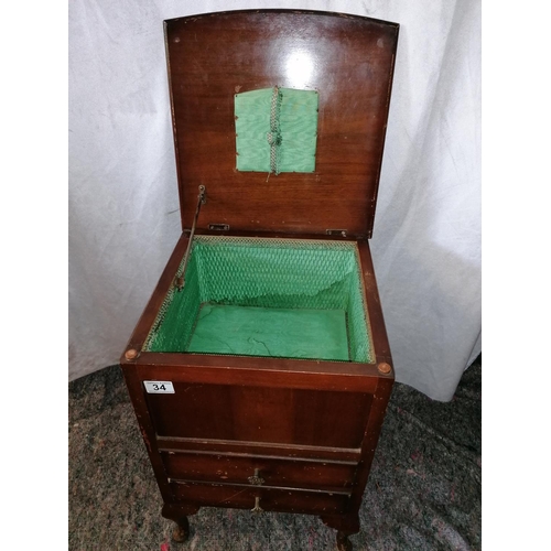 34 - Early 20C sewing cabinet on cabriole legs with lift up lid, two drawers, green silk linings