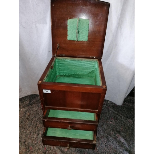 34 - Early 20C sewing cabinet on cabriole legs with lift up lid, two drawers, green silk linings